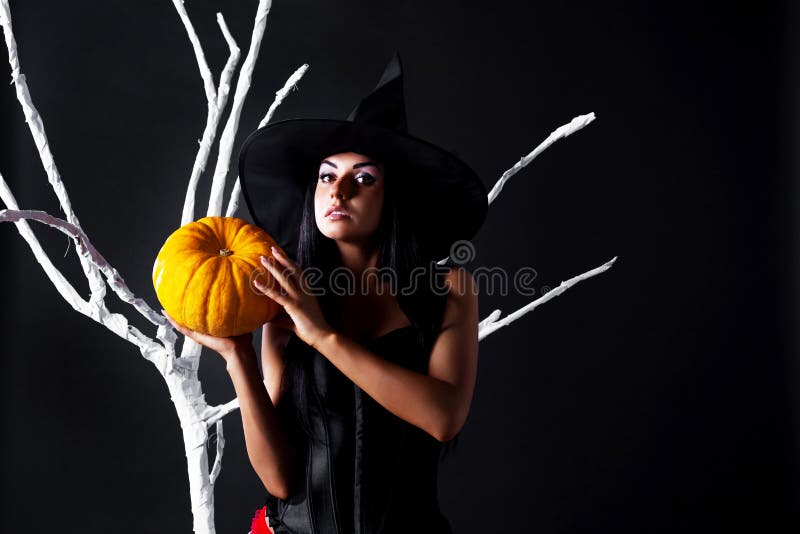 Witch with a pumpkin