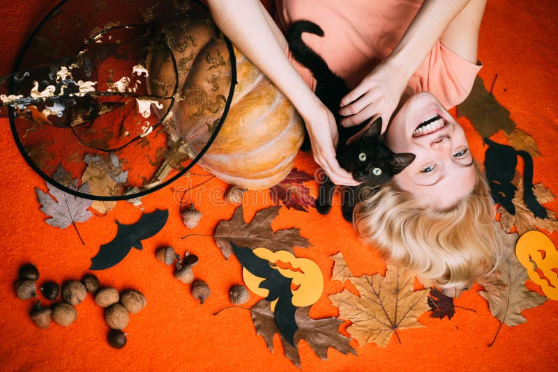 Witch with Pumpkin and black cat. Halloween wide banner with Woman. Halloween wide poster for Happy halloween stock image Witch with Pumpkin and black cat. Halloween wide banner with Woman. Halloween wide poster for Happy halloween stock image