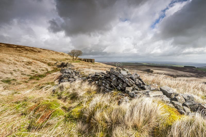 The derelict farmhouse of top withens associated with wuthering heights in the novel of the same name by emily bronte. The derelict farmhouse of top withens associated with wuthering heights in the novel of the same name by emily bronte