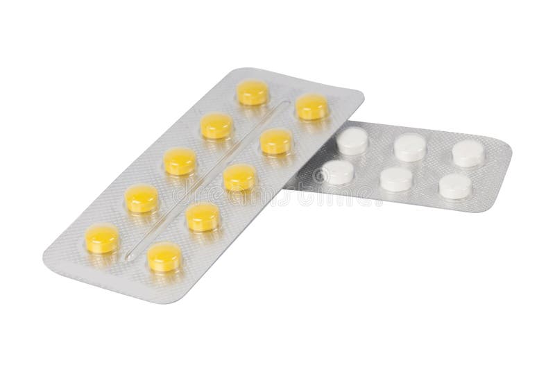 Witte en gele pils-tabletten in blaarpak stock foto Witte en gele pils-tabletten in blaarpak stock foto