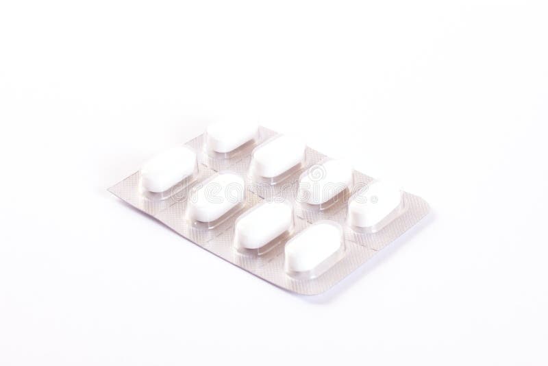 Witte pillen in een blaar stock afbeeldingen Witte pillen in een blaar stock afbeeldingen