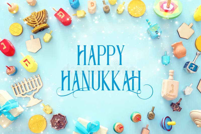 religion image of jewish holiday Hanukkah background with menorah traditional candelabra and spinning top. religion image of jewish holiday Hanukkah background with menorah traditional candelabra and spinning top.