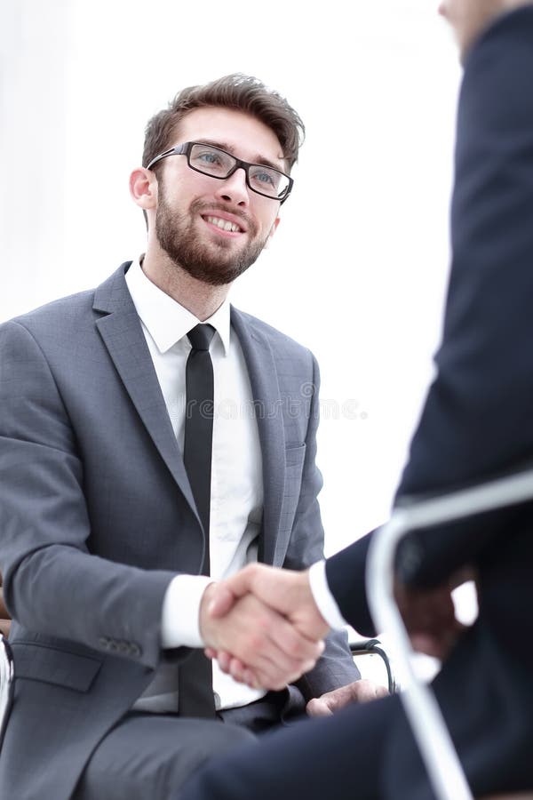 Wo focused coworkers sitting together in a modern office royalty free stock photos Wo focused coworkers sitting together in a modern office royalty free stock photos