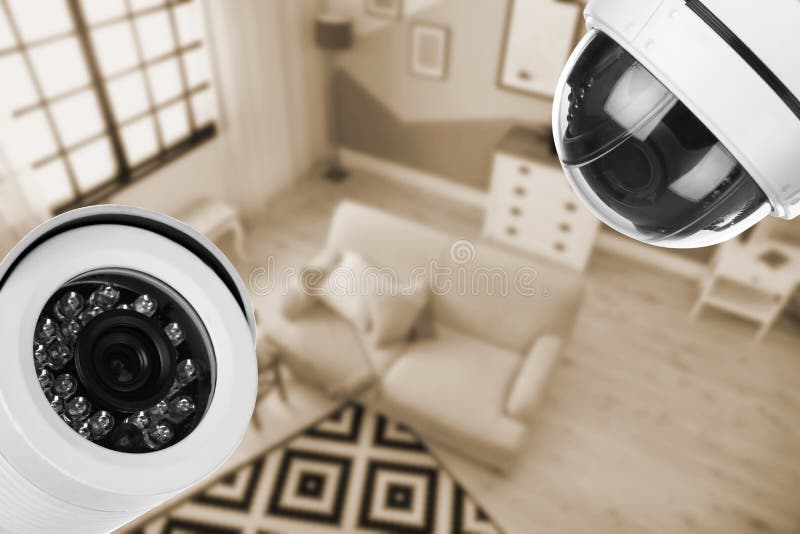 Wohnzimmer unter Überwachungskameraüberwachung stockfotos Wohnzimmer unter Überwachungskameraüberwachung stockfotos