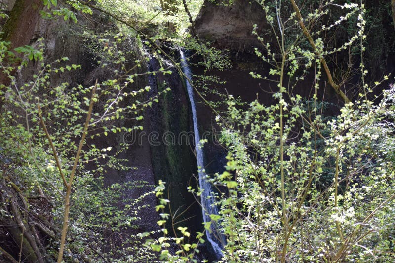 Wolfsschlucht Waterfall, thin and tall waterfall in spring royalty free stock image