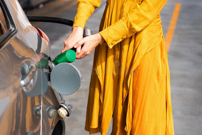 Adding Fuel in Car with Red Plastic Gas Can Stock Image Image of