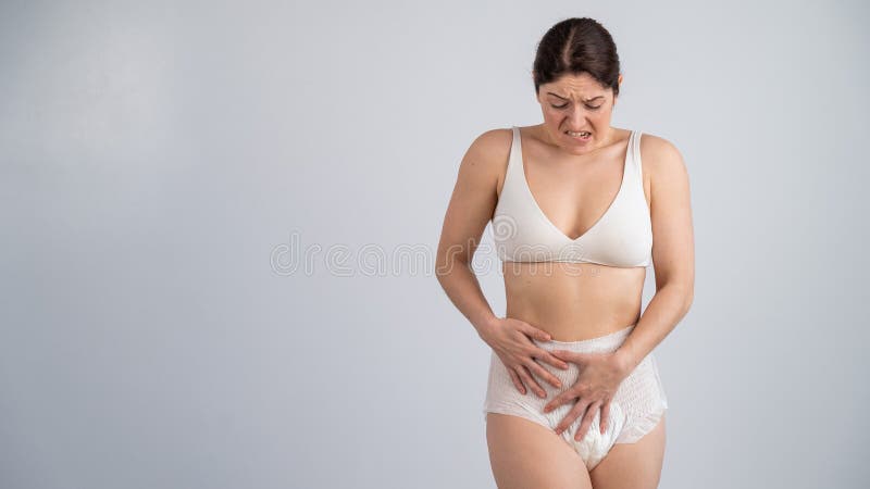 https://thumbs.dreamstime.com/b/woman-adult-diapers-holds-her-hands-her-stomach-urinary-incontinence-problem-woman-adult-diapers-holds-her-hands-275973846.jpg