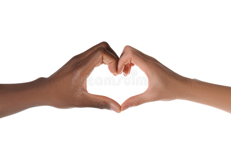 Woman and African American man making heart with hands on white background, closeup