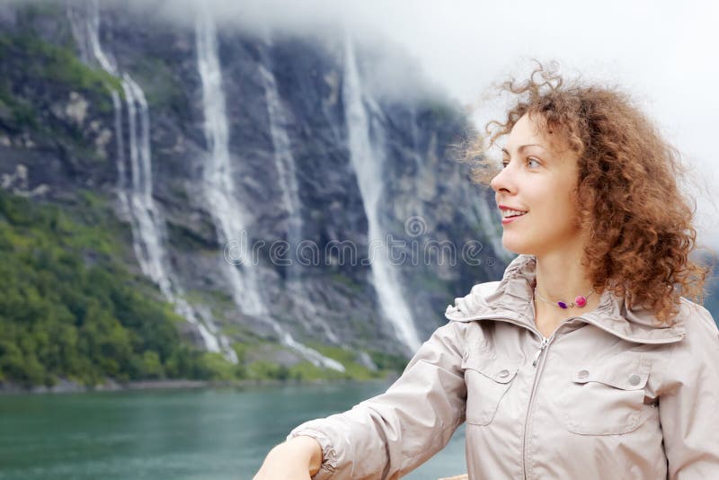 Woman against Seven Sisters Waterfall