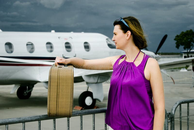 Woman and airplane royalty free stock image