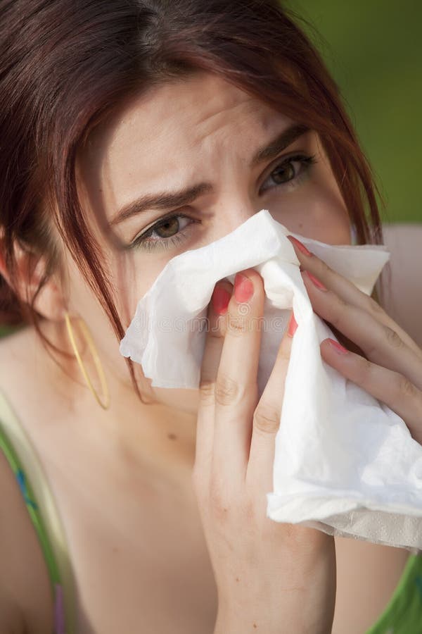 Woman with allergy sneezing royalty free stock images Woman with allergy sneezing royalty free stock images