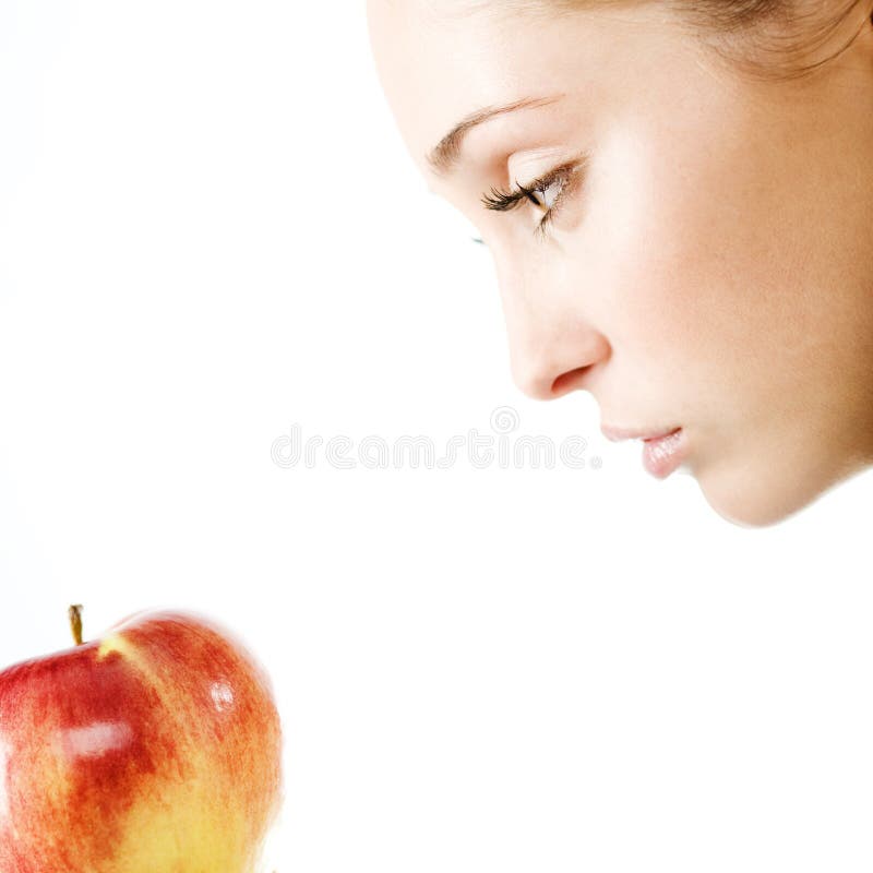 Woman with apple royalty free stock photo