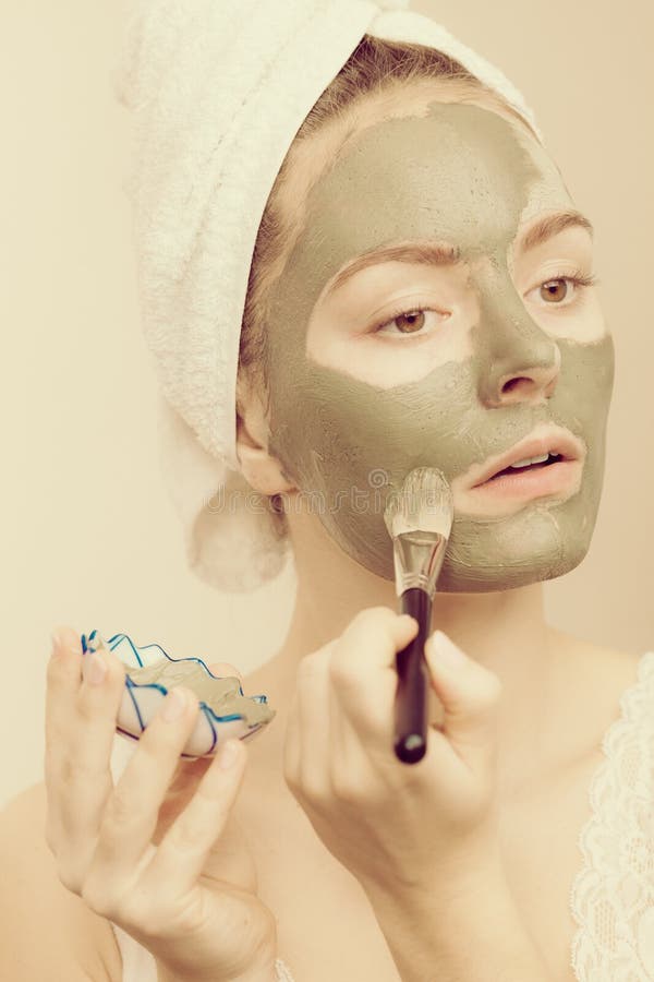 Woman Applying With Brush Clay Mud Mask To Her Face Stock Photo Image Of Cleansing Care