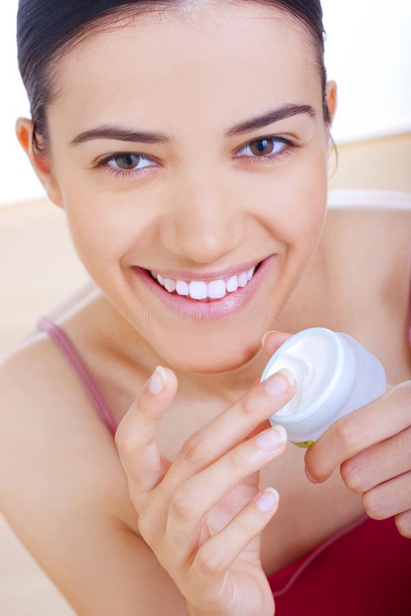 Woman Applying Cream On Her Face Stock Image Image Of Mask Hand 5883081