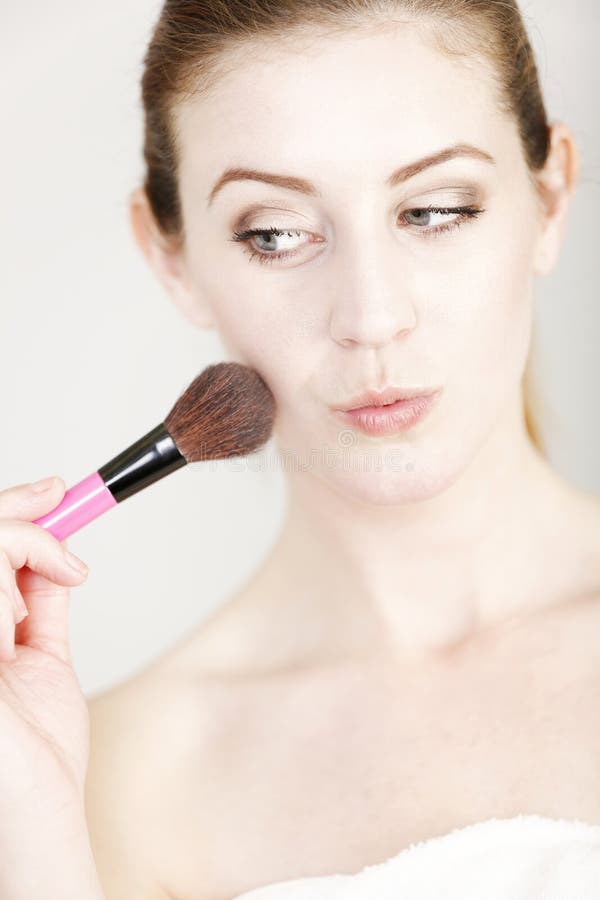 Woman applying make up stock photo. Image of cosmetic - 39398094