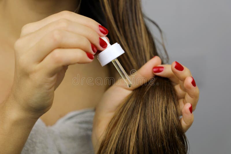 Woman Applying Oil on Dry Hair or Sun Protection Concept. Split Hair Tips. Oiling Hair before Washing Stock Image - Image of hair, macadamia: 168991767 Woman Applying Oil on Dry Hair or Sun Protection Concept. Split Hair Tips. Oiling Hair before Washing Stock Image - Image of hair, macadamia: 168991767