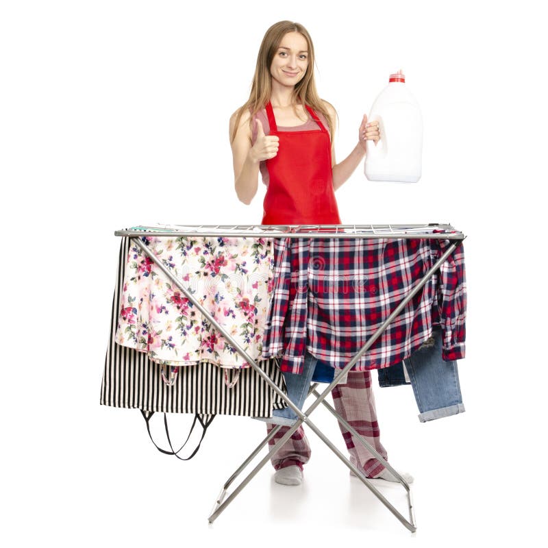 Woman in Apron Clothes Drying Rack with Clean Clothes Plastic Bottle