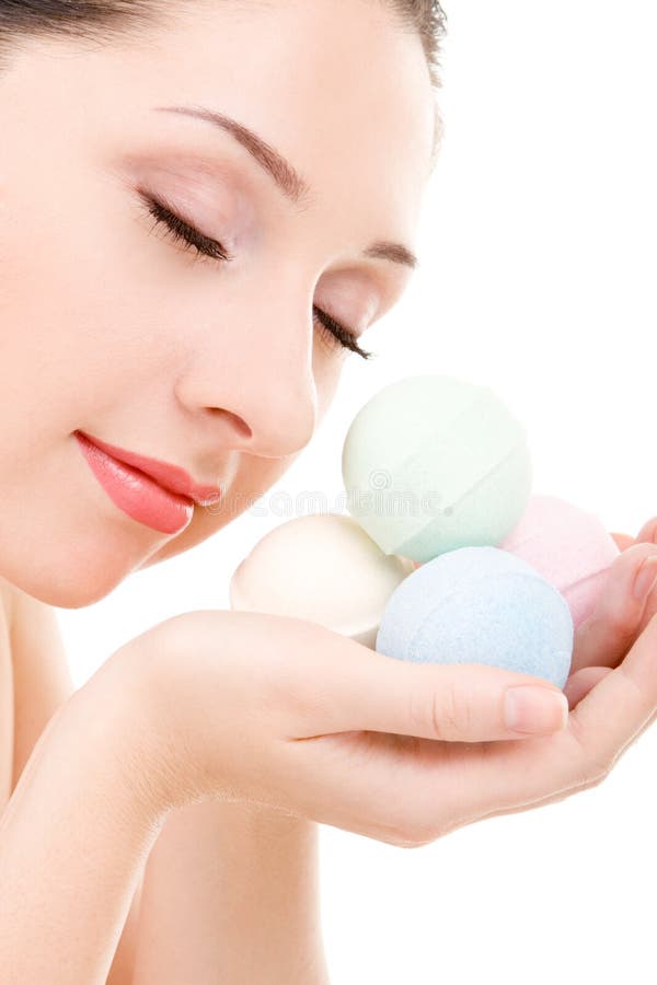 Woman with aromatic balls for spa