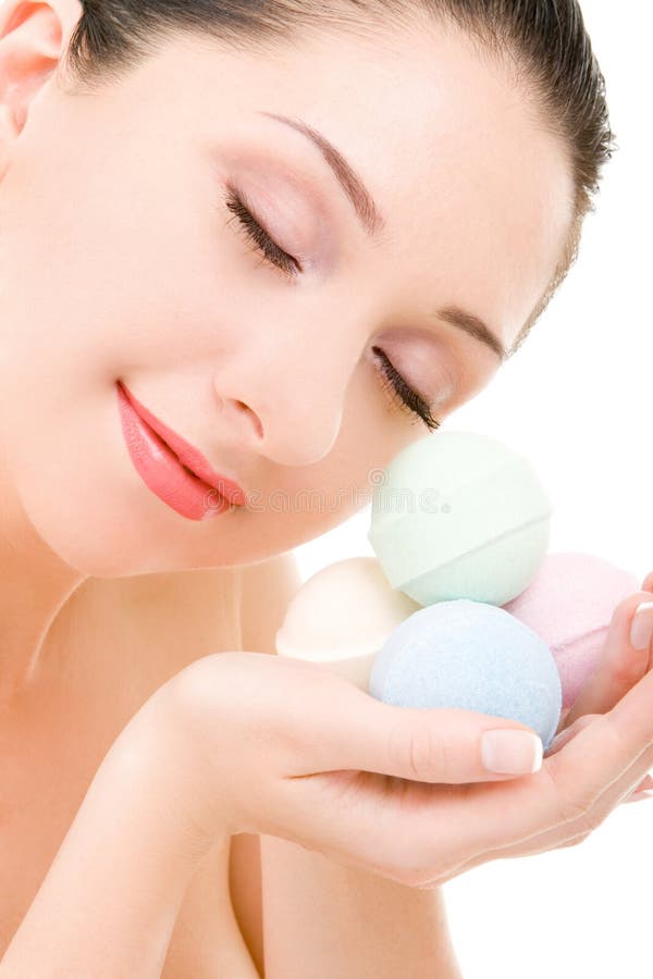 Woman with aromatic balls for spa