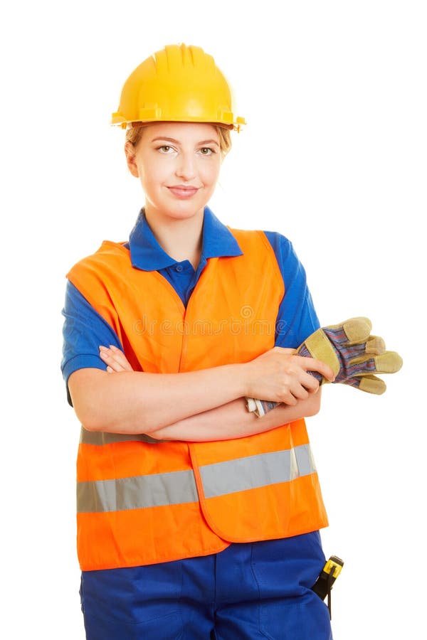 Woman as a construction worker with helmet and safety vest royalty free stock image Woman as a construction worker with helmet and safety vest royalty free stock image