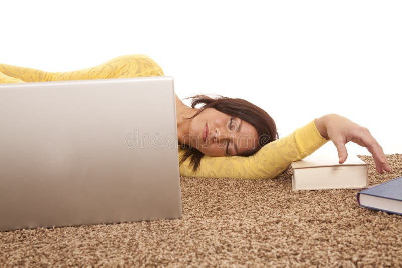 Woman asleep behind computer