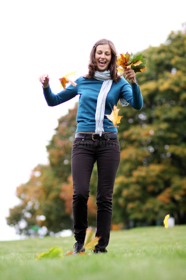 Woman in autumn park