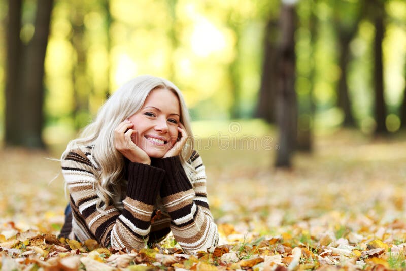 Woman in autumn park stock image. Image of hair, laughing - 195485211
