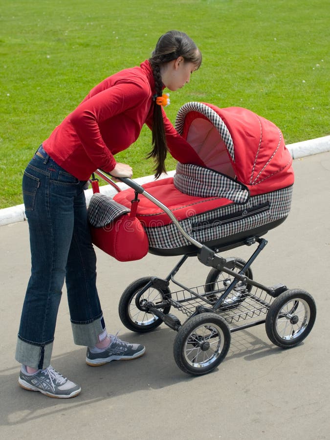 Woman with baby carriage