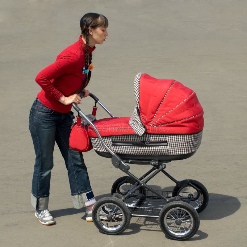 Woman with baby carriage