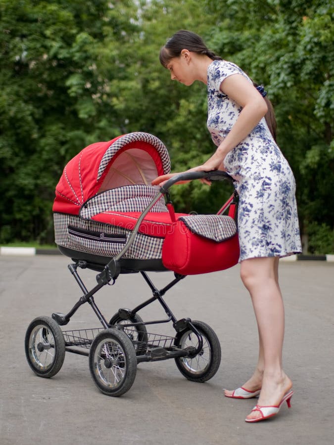 Woman with baby carriage