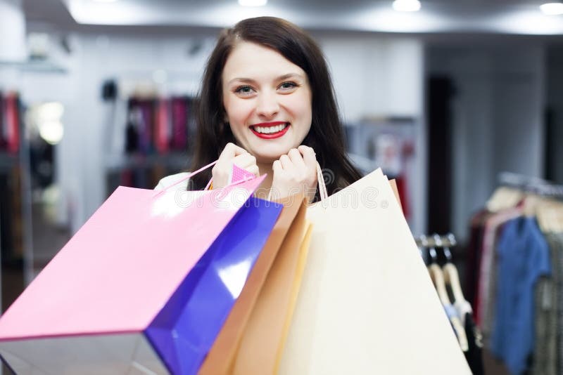 Woman with Bags at Fashion Boutique Stock Photo - Image of cheerful ...