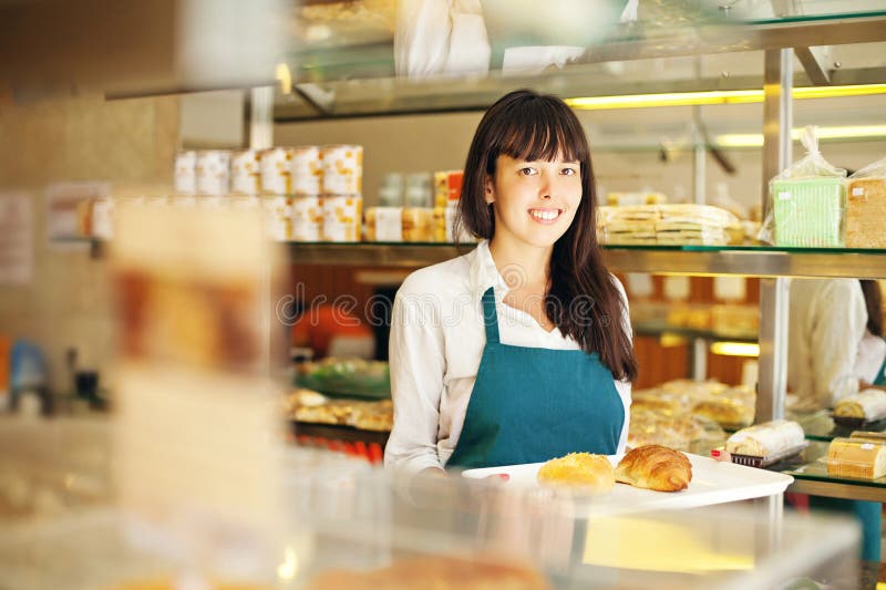 Woman in bakery stock photos Woman in bakery stock photos
