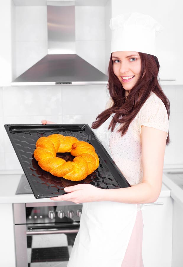 Woman baking bread stock image. Image of bread, european 22242411
