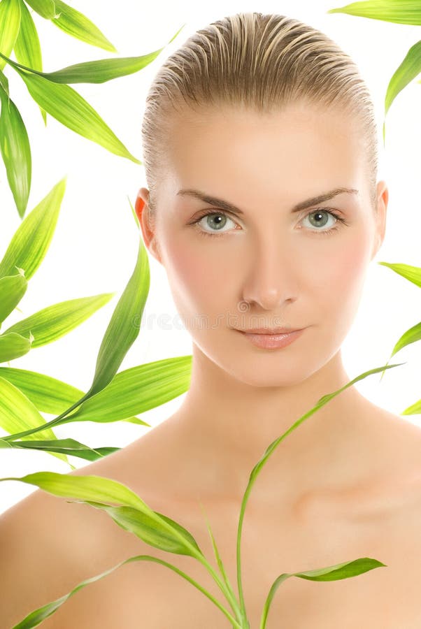 Woman with a bamboo plant