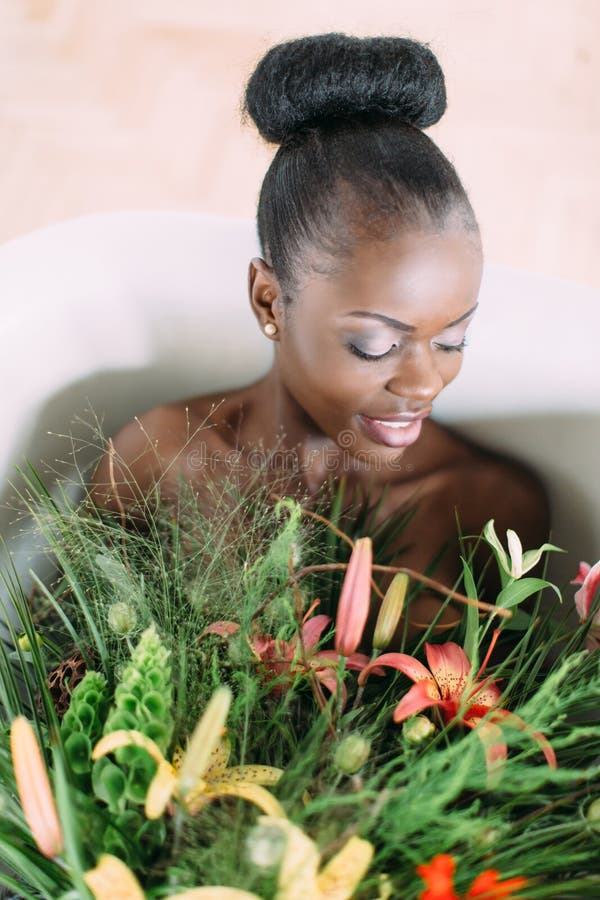 Woman Bathing in a Tub Full of Foam. Beautiful African American Bride in Decorated Bath Stock Photo - Image of cream, home: 155732026 Woman Bathing in a Tub Full of Foam. Beautiful African American Bride in Decorated Bath Stock Photo - Image of cream, home: 155732026