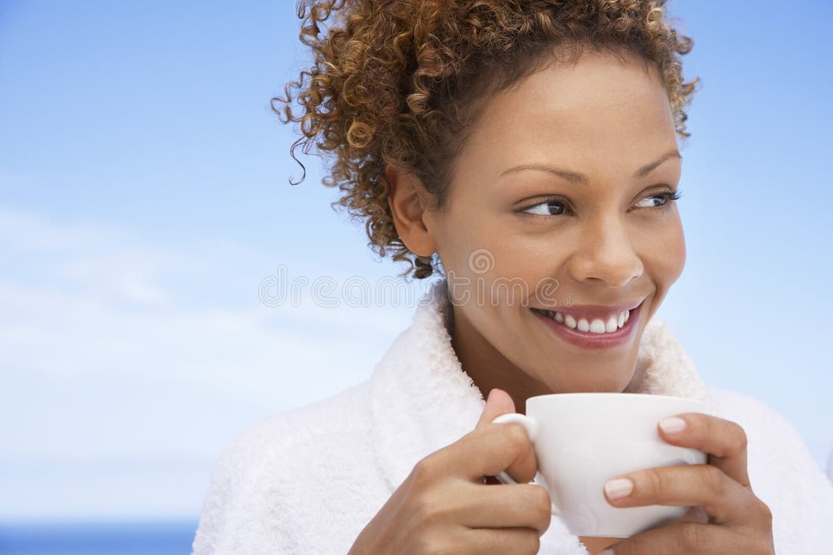 Woman Tasting a Coffee from a Cup in a Restaurant Terrace Stock Photo - Image of drink, feeding: 51186606