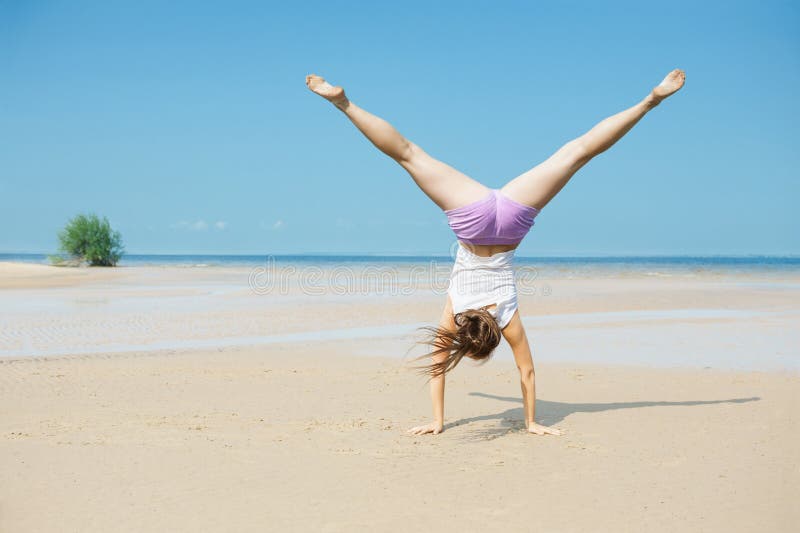 224 Woman Doing Handstand Beach Stock Photos - Free & Royalty-Free ...