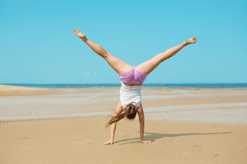 224 Woman Doing Handstand Beach Stock Photos - Free & Royalty-Free ...