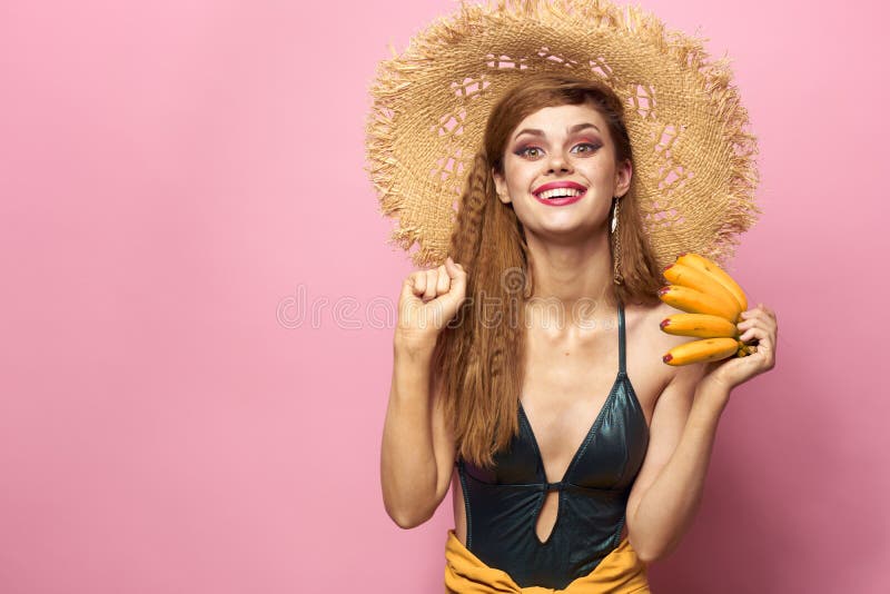 Woman In Beach Straw Hat Bananas Holding Fruits Exotic Swimsuit Pink Background Stock Image 