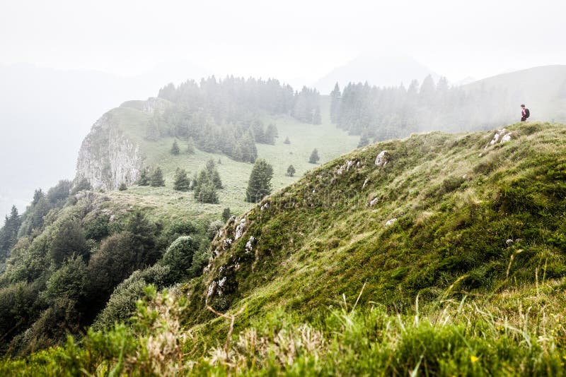 Woman in beautiful mountain landscape stock photos Woman in beautiful mountain landscape stock photos