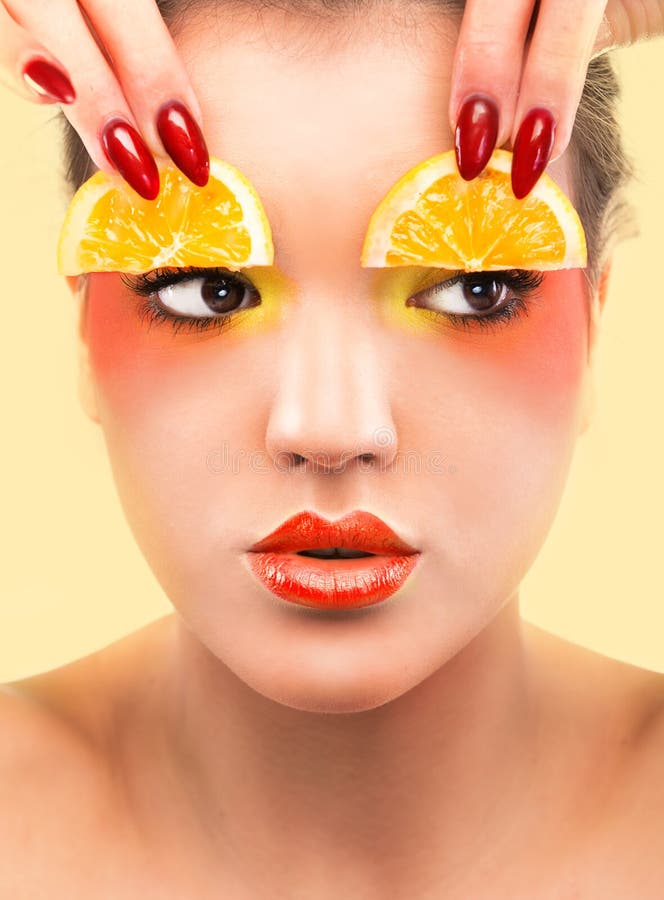 Woman beauty concept with lemon slices