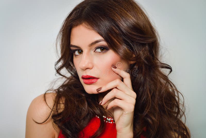 Woman with Beauty Long Brown Hair and Red Lips in Red Dress Stock Image ...