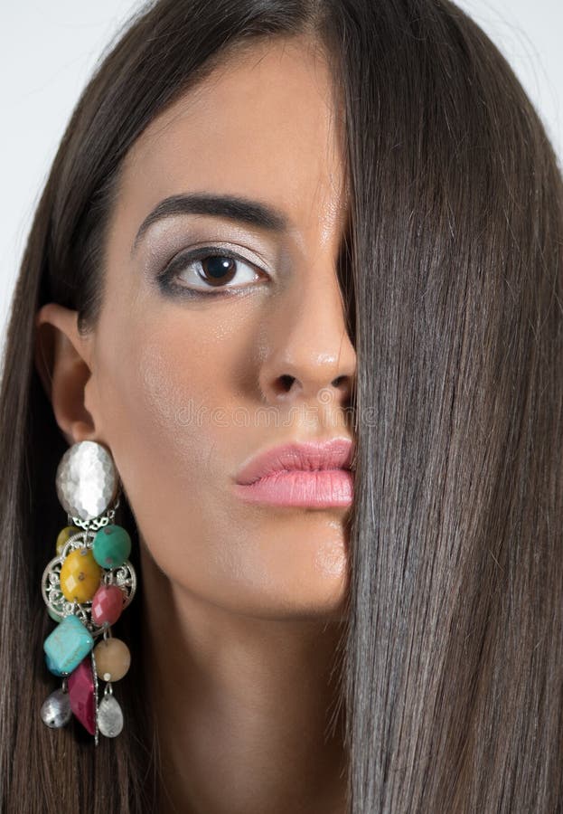 Woman beauty portrait face covered by dark hair royalty free stock images Woman beauty portrait face covered by dark hair royalty free stock images