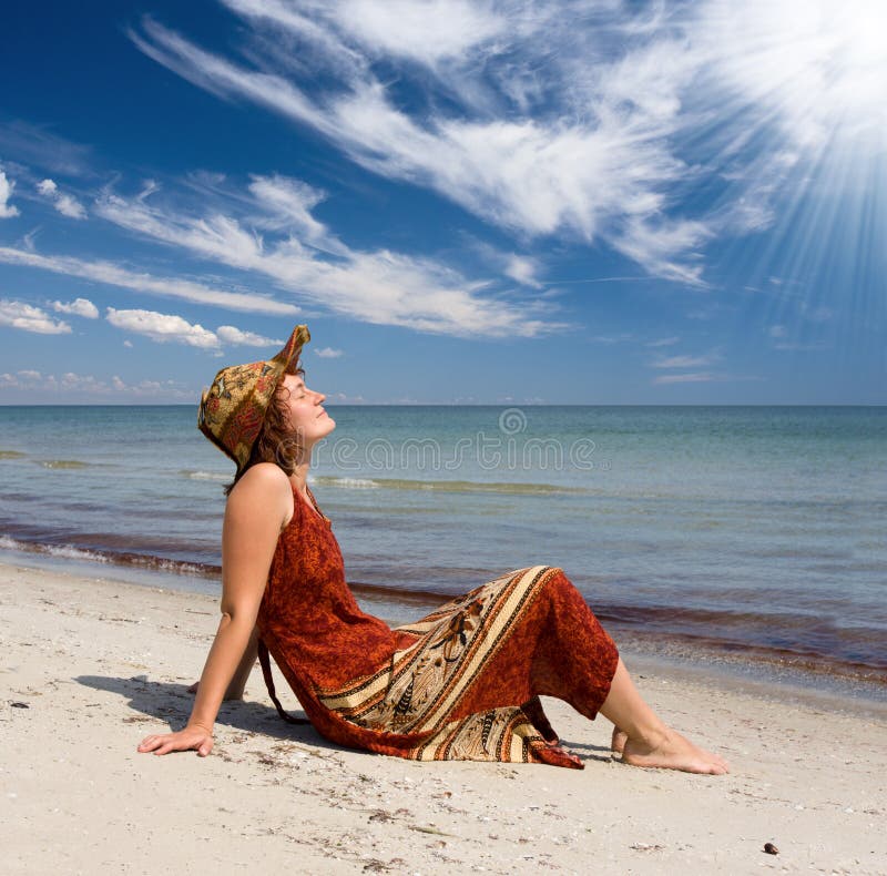 Woman become sunburnt at sea beach