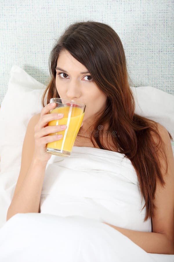 Woman in Bed Drinking Orange Juice Stock Image Image of girl