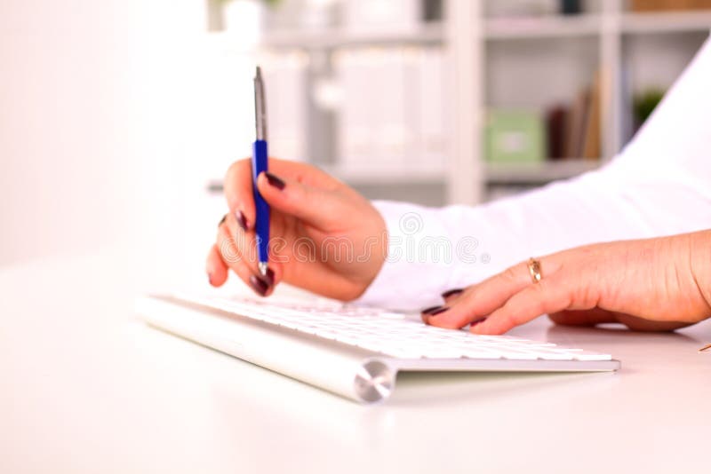 The woman behind the desk in the Office