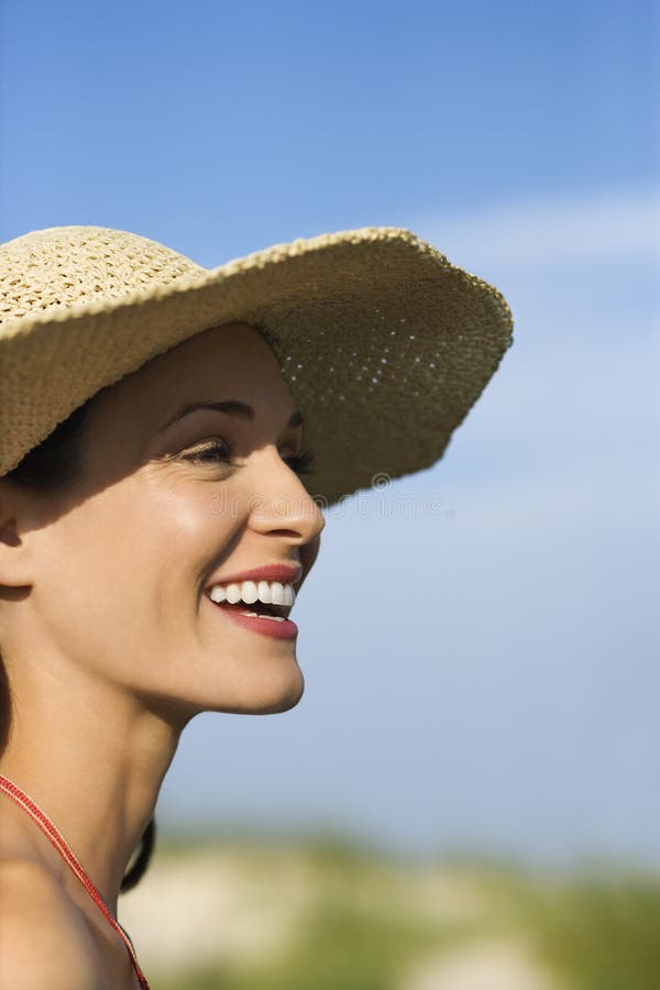Woman in bikini and straw hat. stock images