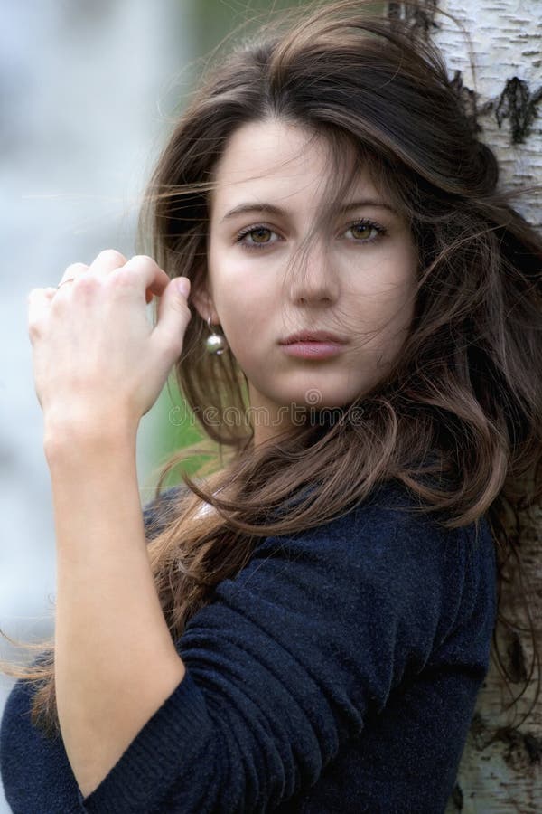 Woman in birch forest