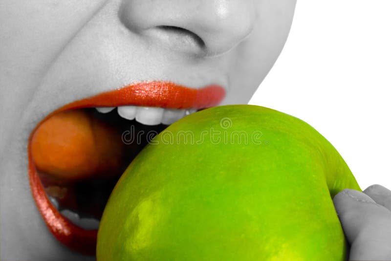 Woman biting apple