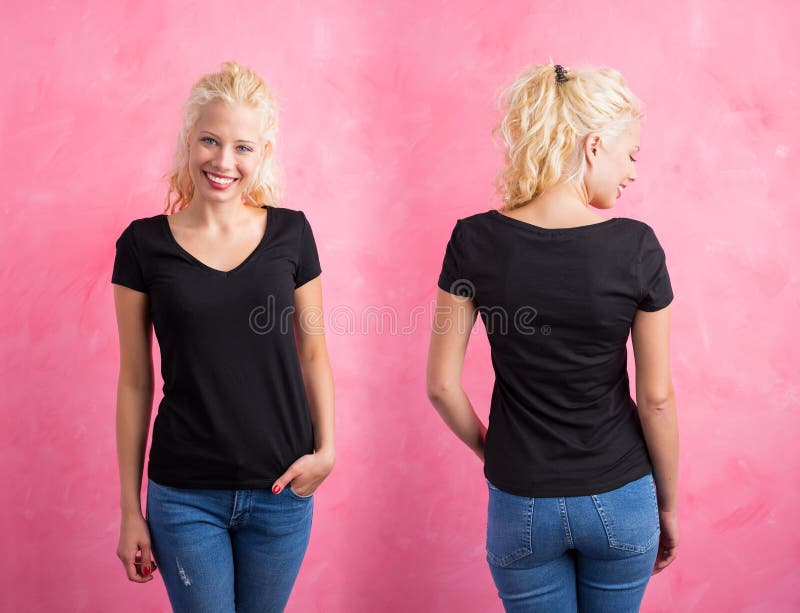 Woman in black V-neck T-shirt on pink background